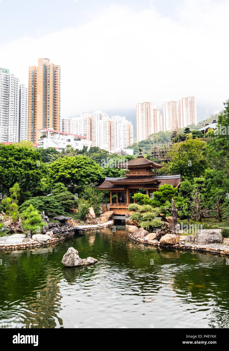 The juxaposition of the old and new China. Ancient wooden pagoda with
