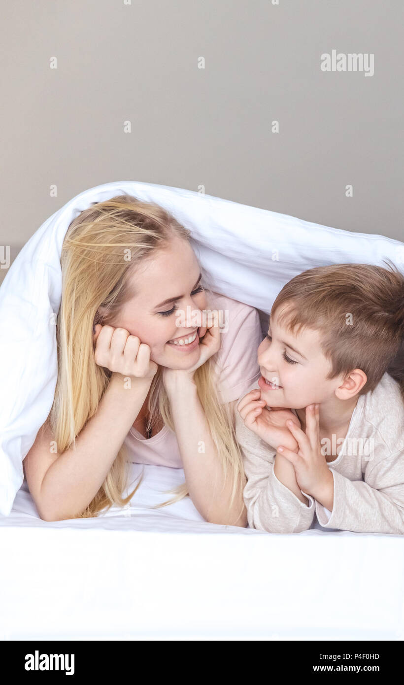 Mother son under blanket hires stock photography and images Alamy