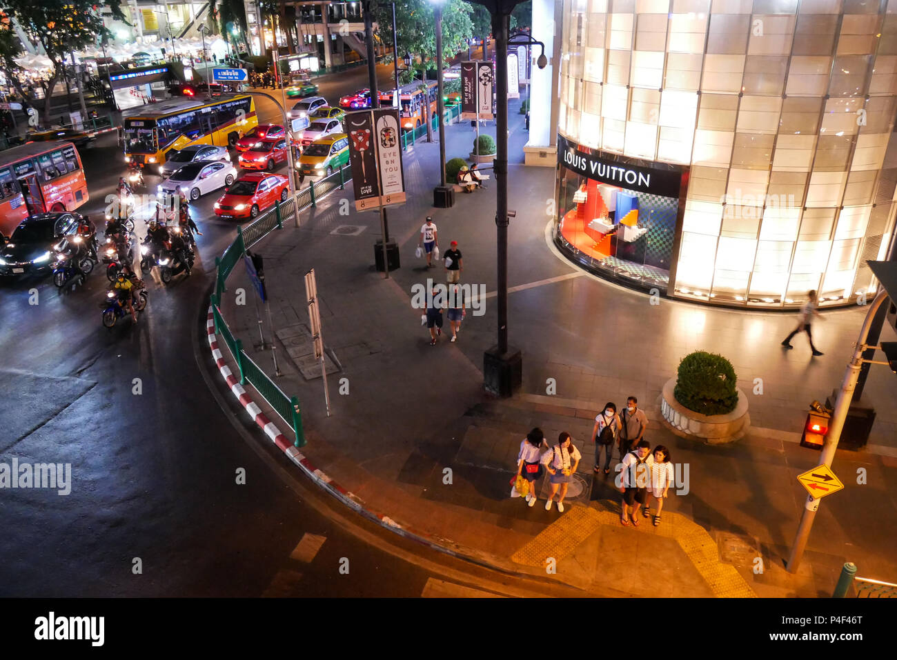 BANGKOK, THAILAND - MARCH 12, 2017: Ratchaprasong Intersection, shopping mall district in Bangkok, Thailand early in the evening and traffic jam Stock Photo