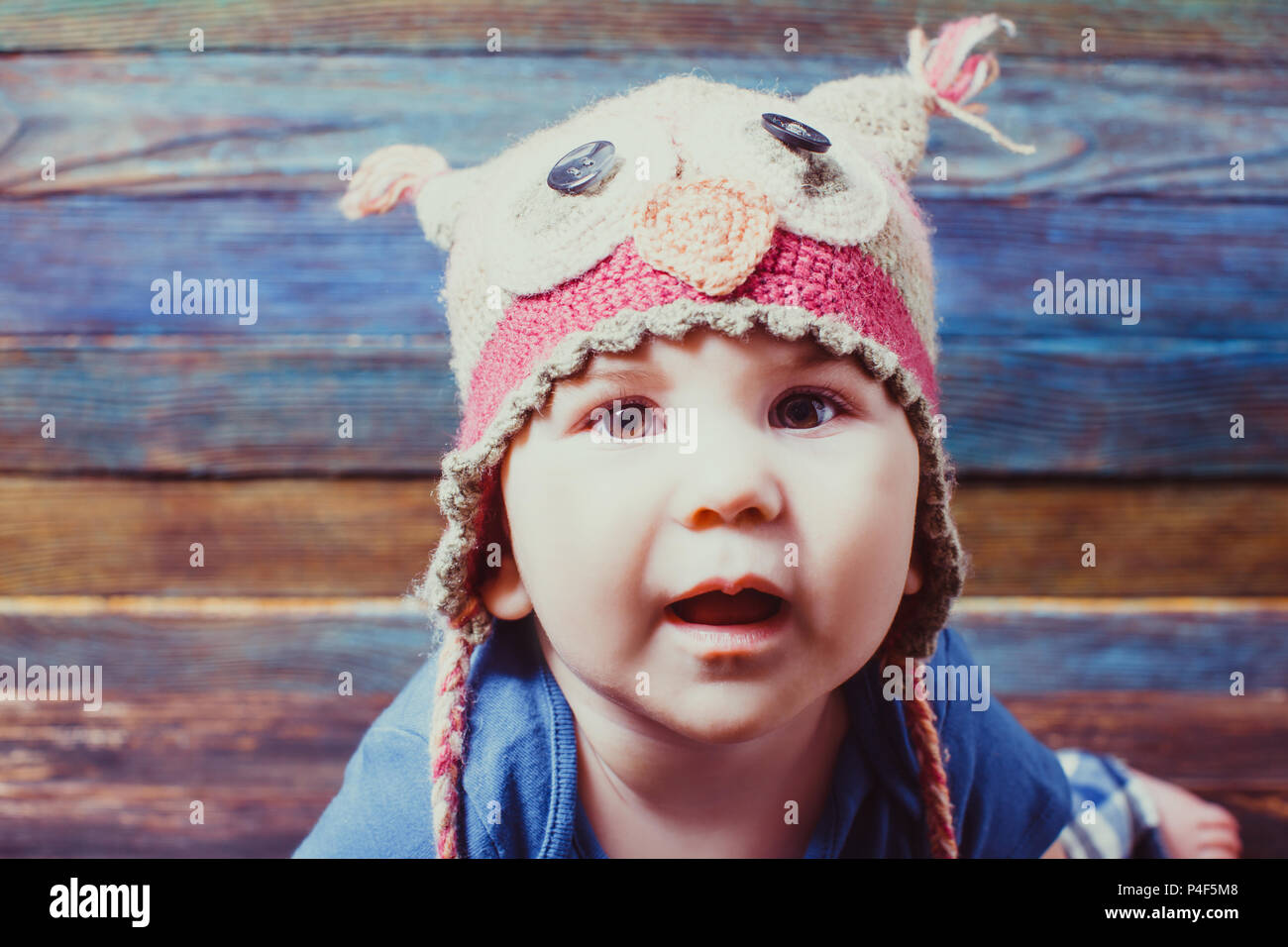 Portrait of cute baby wearing funny hat Stock Photo - Alamy