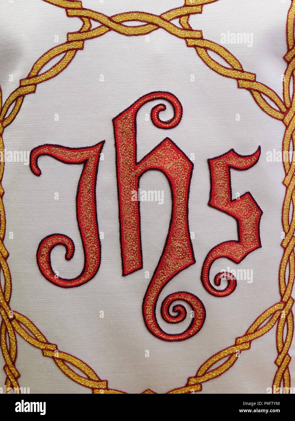 IHS sign, detail of church vestment made by the Sisters of Charity of