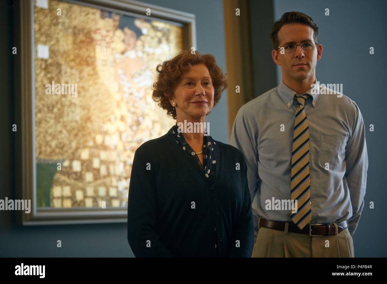 Woman in gold film still hi-res stock photography and images - Alamy