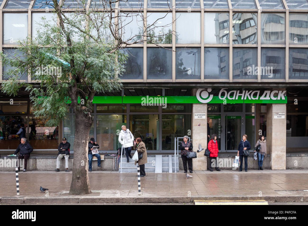 Sofia, Bulgaria, passersby are waiting for a finilage of DSK Bank Stock Photo