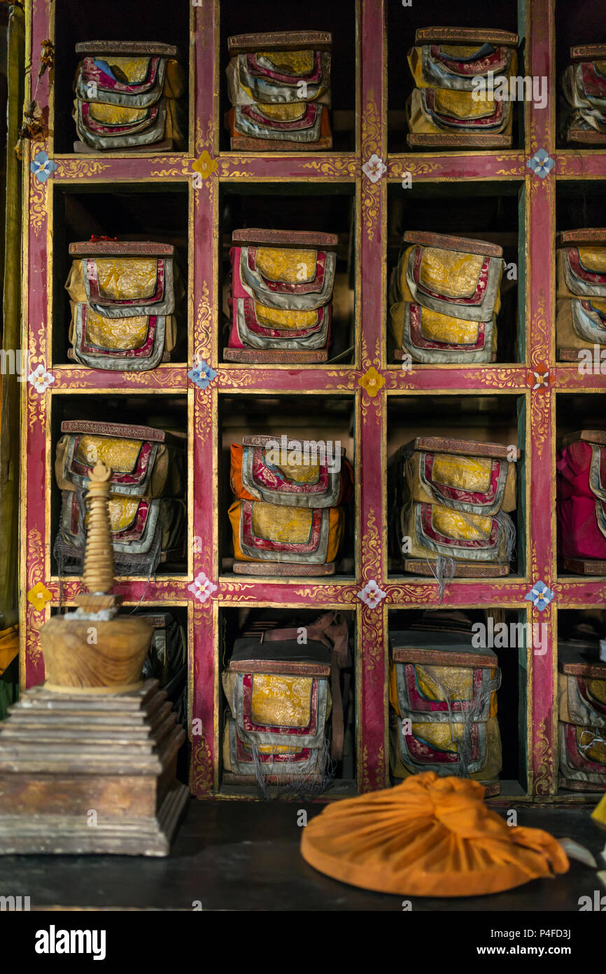 Folios of old manuscripts in library of Stakna gompa Tibetan Buddhist Monastery in Ladakh, India Stock Photo