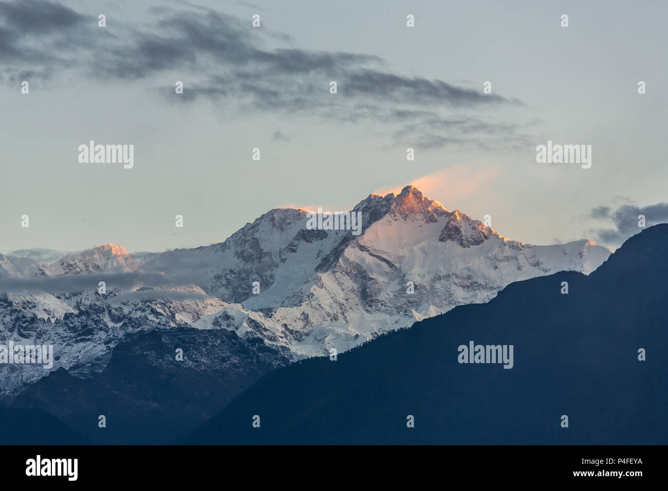 Kangchenjunga mountain at sunrise view from Pelling in Sikkim, India. Kangchenjunga is the third highest mountain in the world. Stock Photo