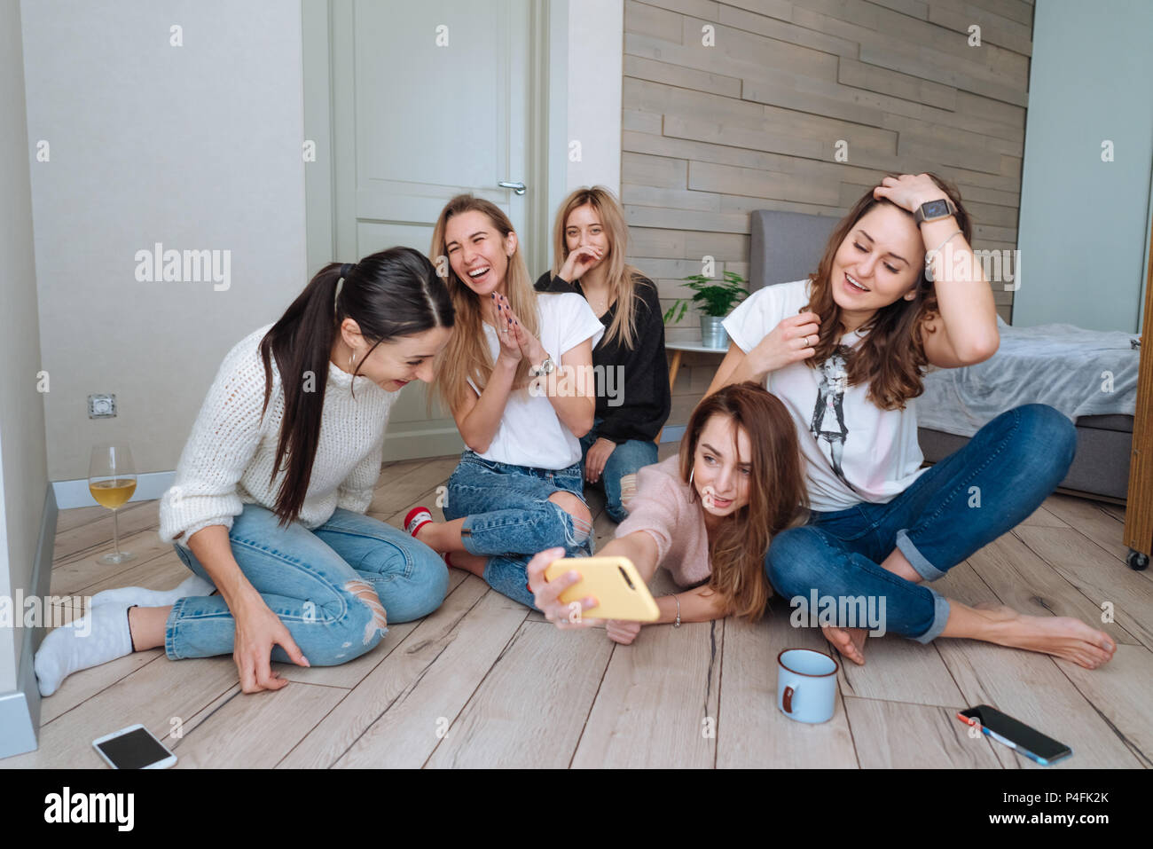 girls on the floor make selfie Stock Photo - Alamy