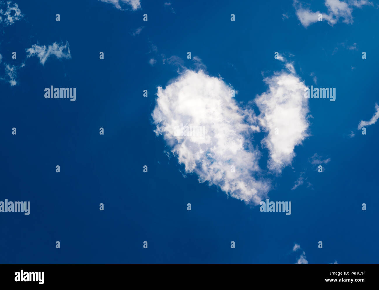heart shaped cloud in the blue sky Stock Photo - Alamy