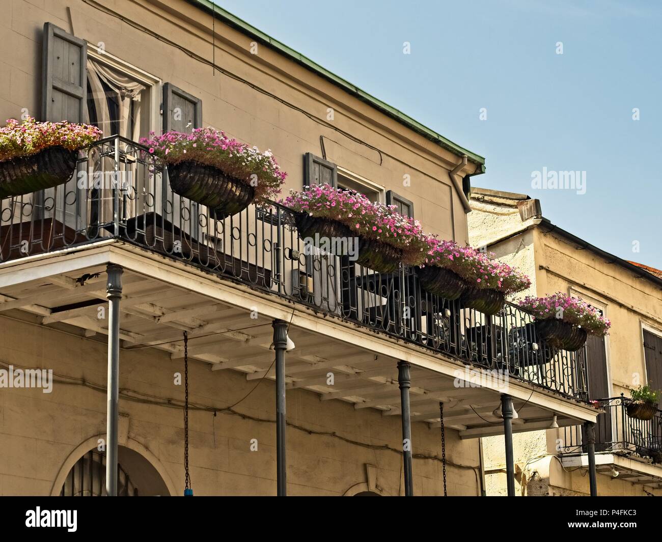 New Orleans, LA USA - May 9, 2018  -  Old French Quarter Buildings with Balcony and Flowers #5 Stock Photo