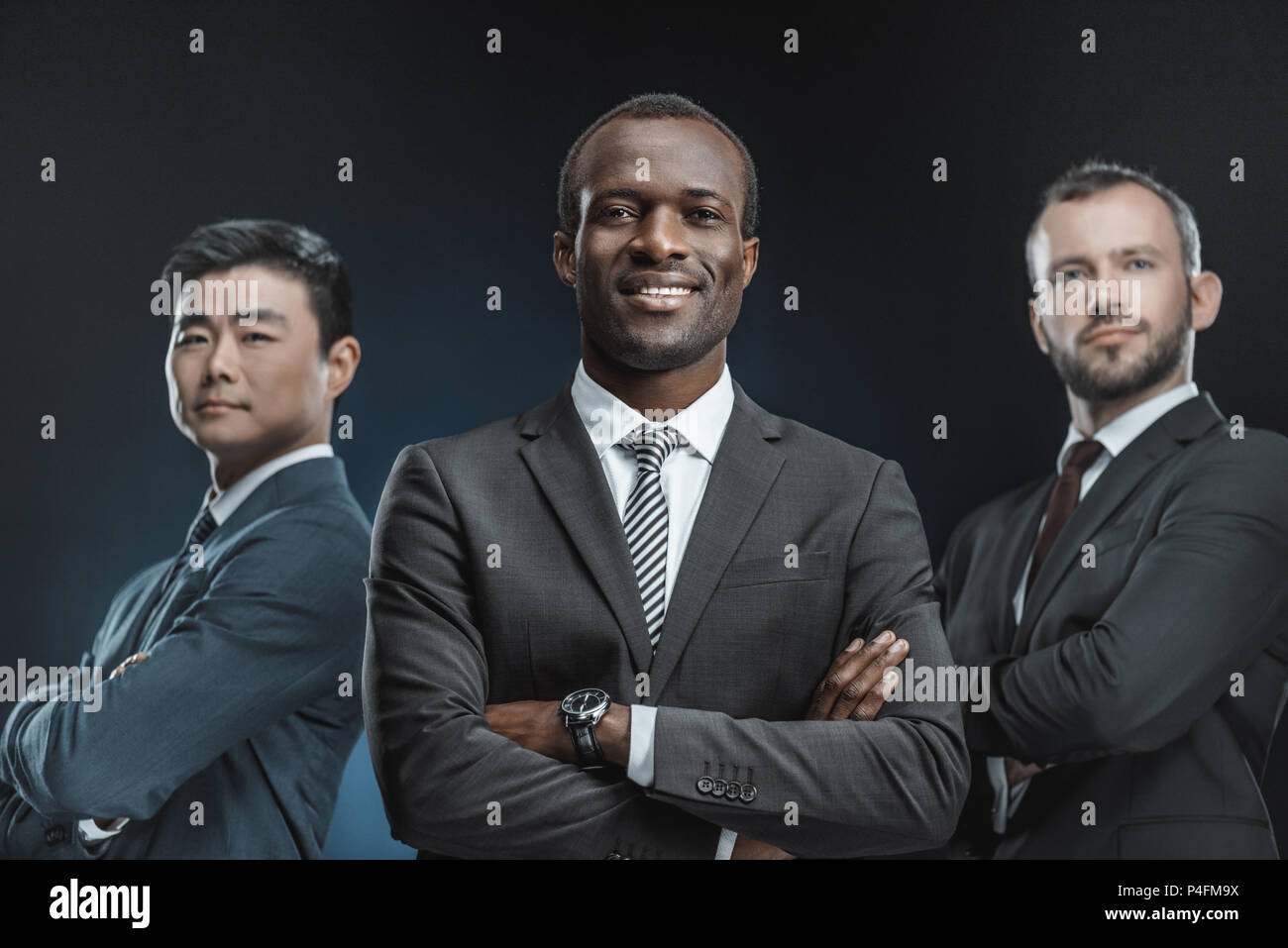 Group of businessmen suits hi-res stock photography and images - Alamy