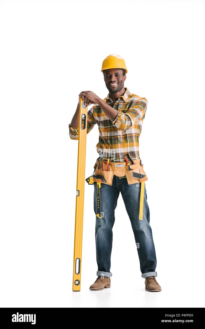 happy africanamerican construction worker with leveling tool isolated