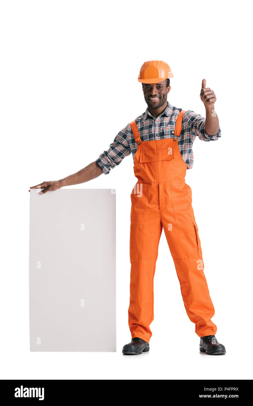 african-american builder with blank white banner shoing thumb up isolated on white Stock Photo