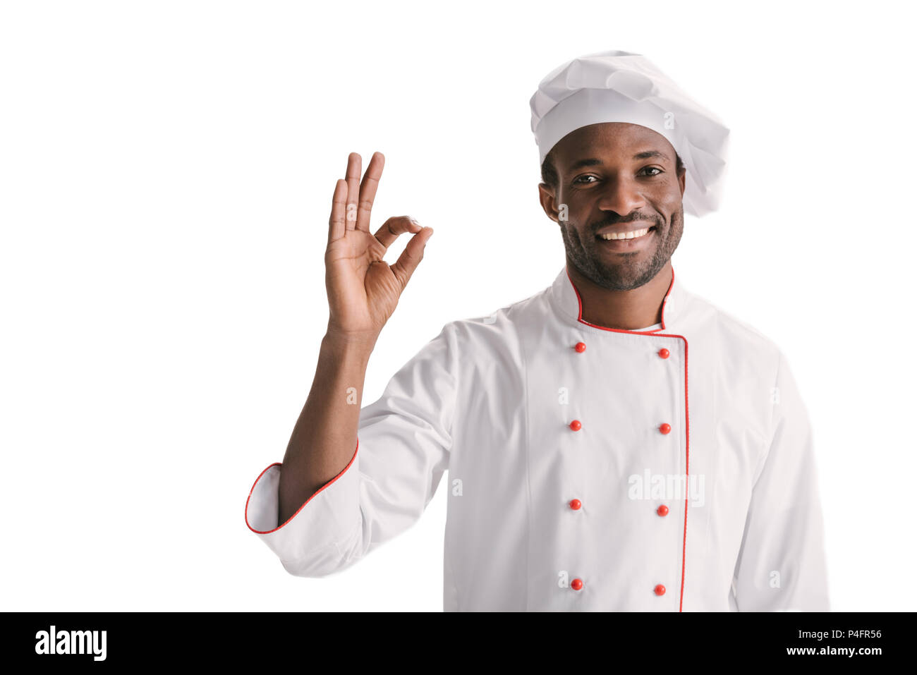 smiling african-american chef showing okay sign isolated on white Stock ...
