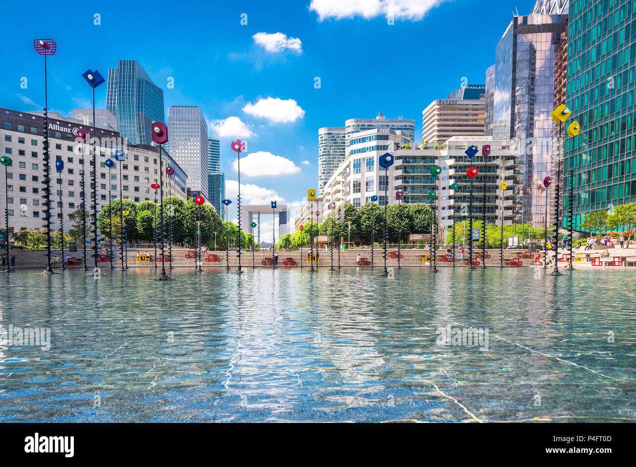 Le Bassin de Takis" by Greek artist Takis is a colourful piece of art  integrated into a water feature at La Defense in Paris, France Stock Photo  - Alamy