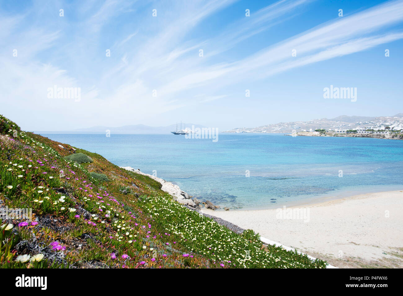 Greek Flowers over Beach Stock Photo