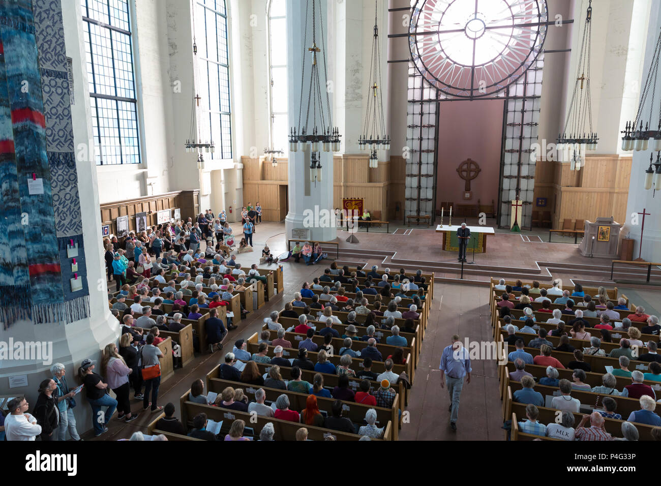 Seattle, USA. 21 June 2018. Hundreds of supporters gathered at St. Mark's Episcopal Cathedral in Capitol Hill for an interfaith prayer and vigil in support of migrants and asylum-seekers who come to the U.S. and to protest the inhumane separation of children from their parents. The two mile 'Prayer and Procession for Families at the Border' began at Saint Mark’s Episcopal Cathedral in ended at St. James Roman Catholic Cathedral in First Hill. Credit: Paul Christian Gordon/Alamy Live News Stock Photo