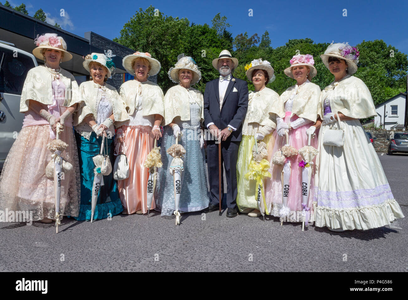 Skibbereen, West Cork, Ireland. 22ndJune, 2018. A scorching hot day here in West Cork with the sun blazing in a clear blue sky, unfortunately the ladies of the Cobh Animation Team are definitely not dressed for the beach in their Victorian vintage Costumes or Dresses!Credit: aphperspective/Alamy Live News Stock Photo