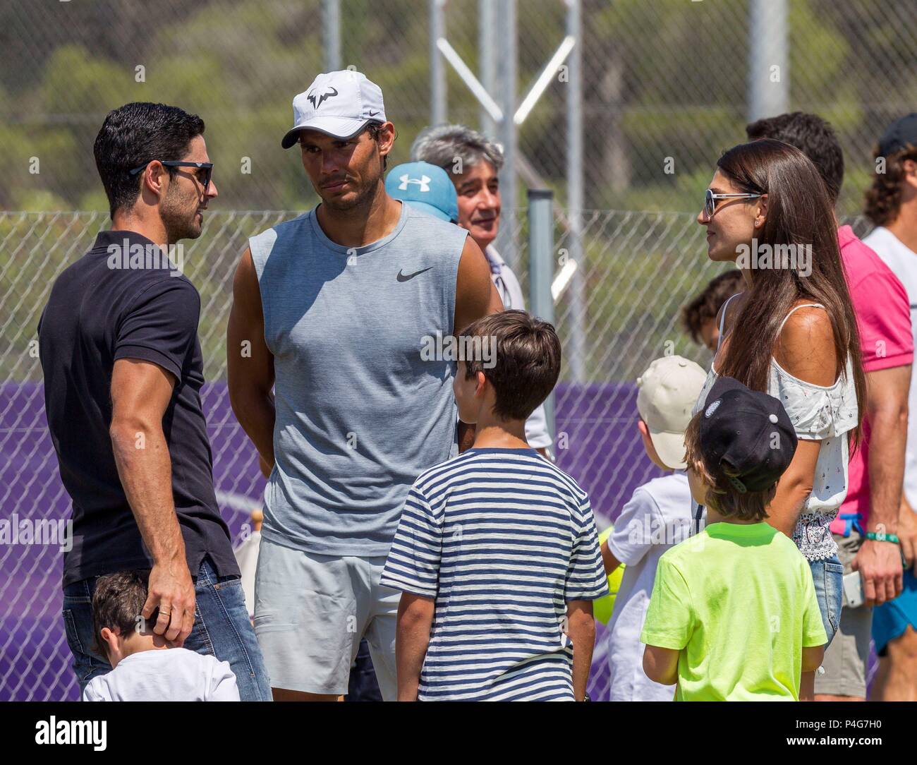 Spanish Tennis Player Rafael Nadal 2 L Talks To Manchester City S Assistant Coach Mikel Arteta L And His Wife Spanish Model Lorena Bernal R After His Training Session At Santa Ponca Tennis Club