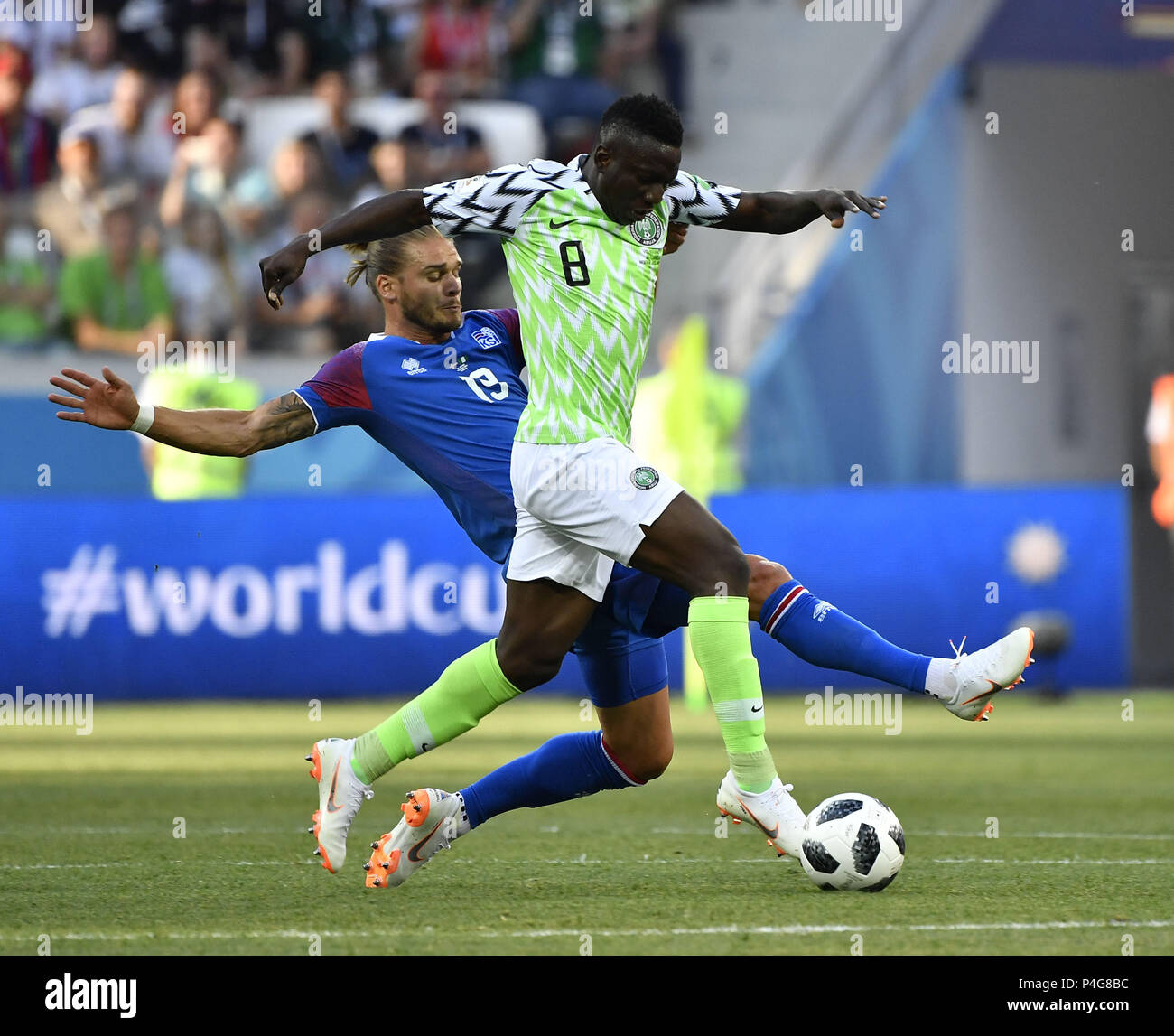 Volgograd, Russia. 22nd June, 2018. Oghenekaro Etebo (R) of Nigeria vies with Rurik Gislason of Iceland during the 2018 FIFA World Cup Group D match between Nigeria and Iceland in Volgograd, Russia, June 22, 2018. Credit: He Canling/Xinhua/Alamy Live News Stock Photo