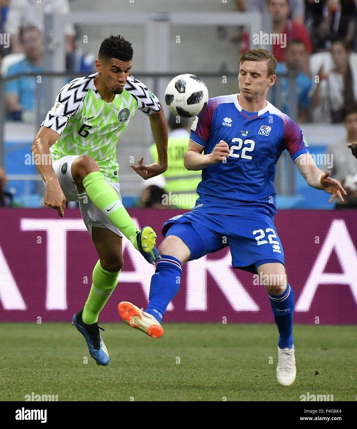 Volgograd, Russia. 22nd June, 2018. Leon Balogun (L) of Nigeria vies with Jon Bodvarsson of Iceland during the 2018 FIFA World Cup Group D match between Nigeria and Iceland in Volgograd, Russia, June 22, 2018. Credit: He Canling/Xinhua/Alamy Live News Stock Photo