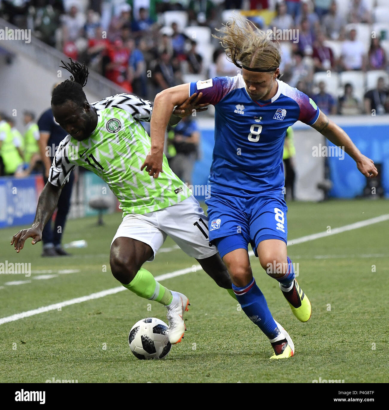 Volgograd, Russia. 22nd June, 2018. Victor Moses (L) of Nigeria vies with Birkir Bjarnason of Iceland during the 2018 FIFA World Cup Group D match between Nigeria and Iceland in Volgograd, Russia, June 22, 2018. Credit: He Canling/Xinhua/Alamy Live News Stock Photo