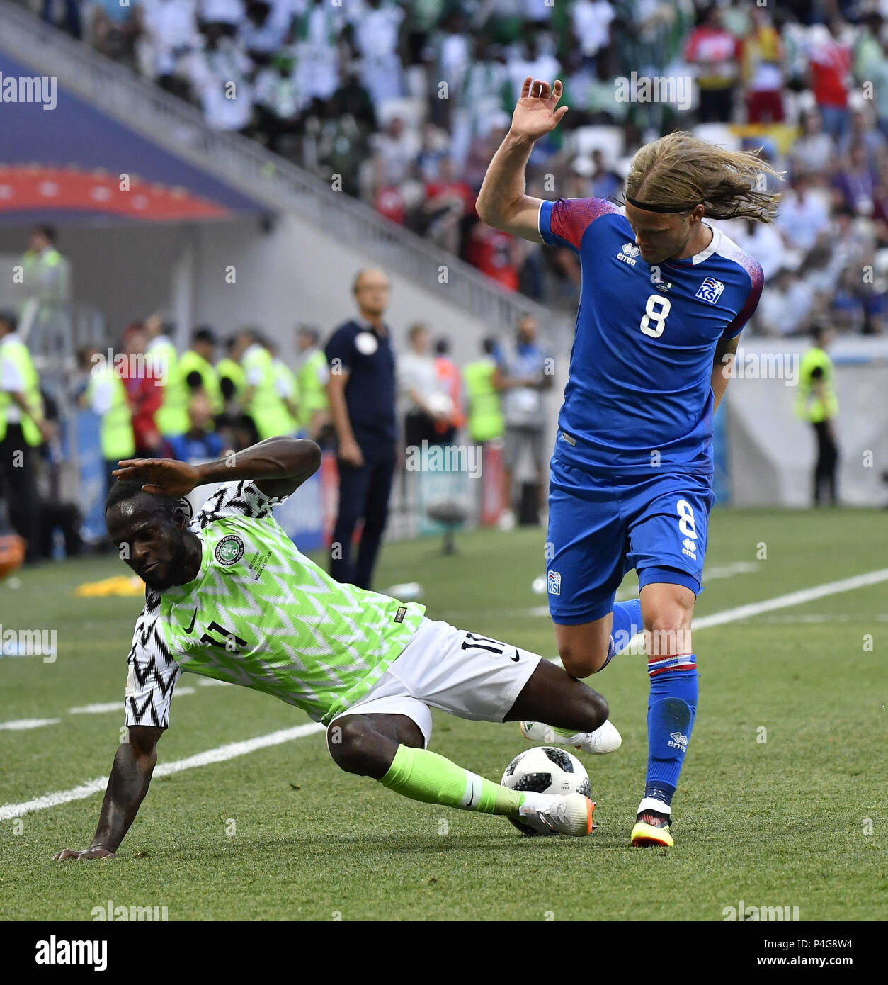 Volgograd, Russia. 22nd June, 2018. Victor Moses (L) of Nigeria vies with Birkir Bjarnason of Iceland during the 2018 FIFA World Cup Group D match between Nigeria and Iceland in Volgograd, Russia, June 22, 2018. Credit: He Canling/Xinhua/Alamy Live News Stock Photo