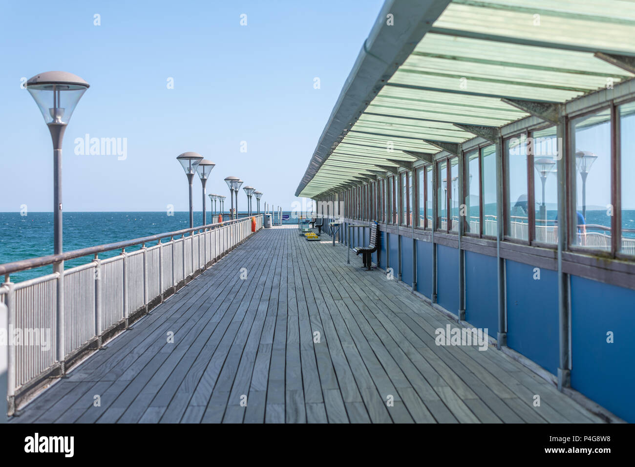 Bournemouth, UK. 22nd June 2018. A view down Boscombe pier in Bournemouth. Thomas Faull/Alamy Live News Stock Photo