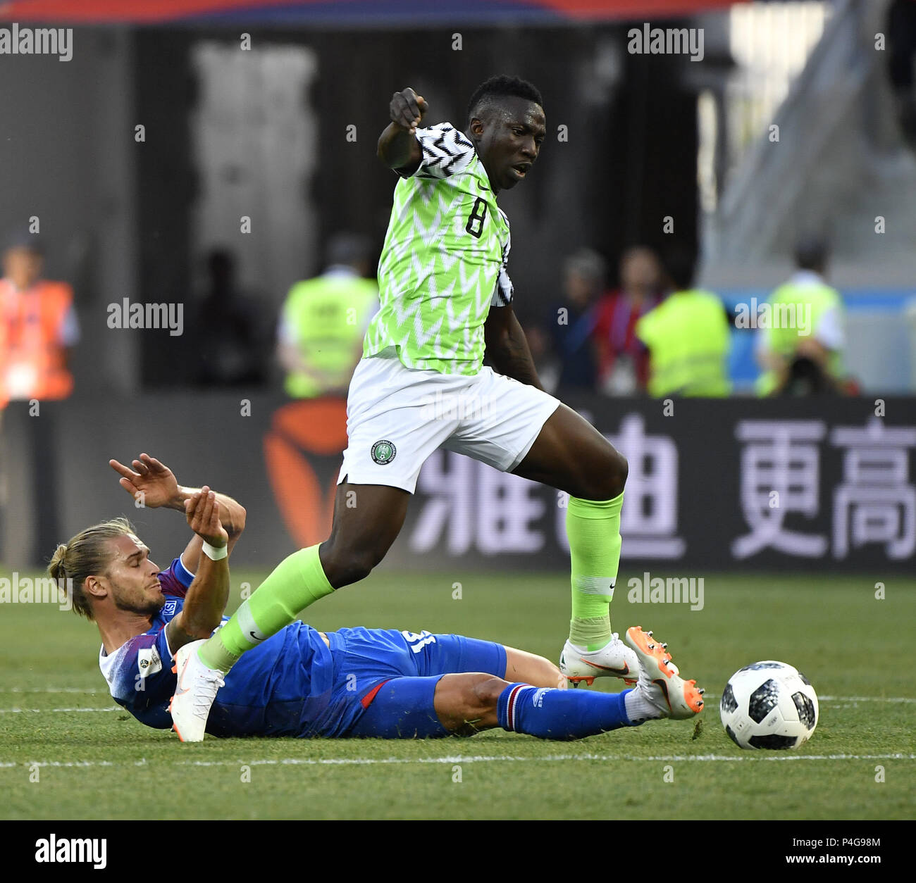 Volgograd, Russia. 22nd June, 2018. Oghenekaro Etebo (top) of Nigeria vies with Rurik Gislason of Iceland during the 2018 FIFA World Cup Group D match between Nigeria and Iceland in Volgograd, Russia, June 22, 2018. Credit: He Canling/Xinhua/Alamy Live News Stock Photo