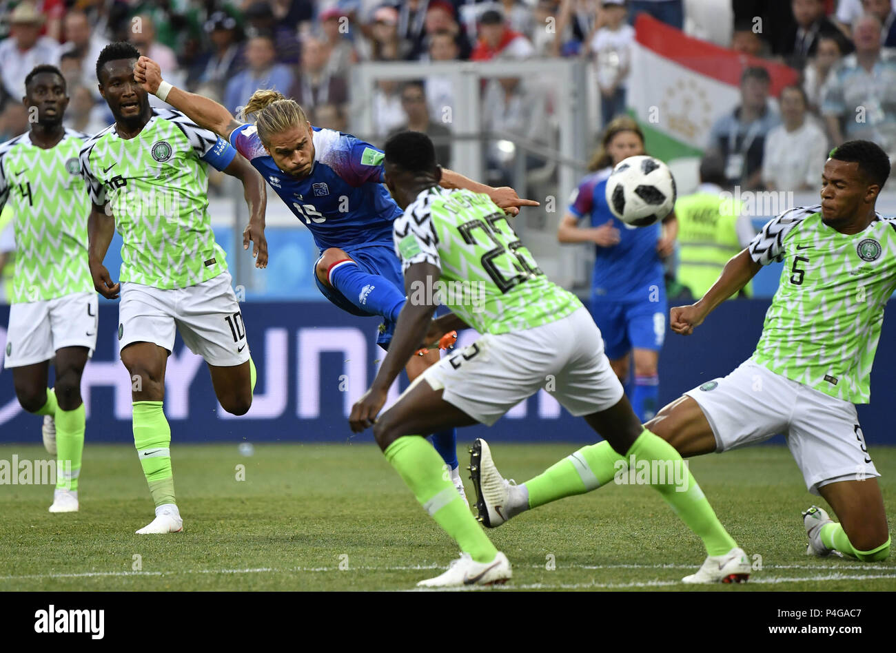 Volgograd, Russia. 22nd June, 2018. Rurik Gislason (C) of Iceland shoots during the 2018 FIFA World Cup Group D match between Nigeria and Iceland in Volgograd, Russia, June 22, 2018. Nigeria won 2-0. Credit: He Canling/Xinhua/Alamy Live News Stock Photo