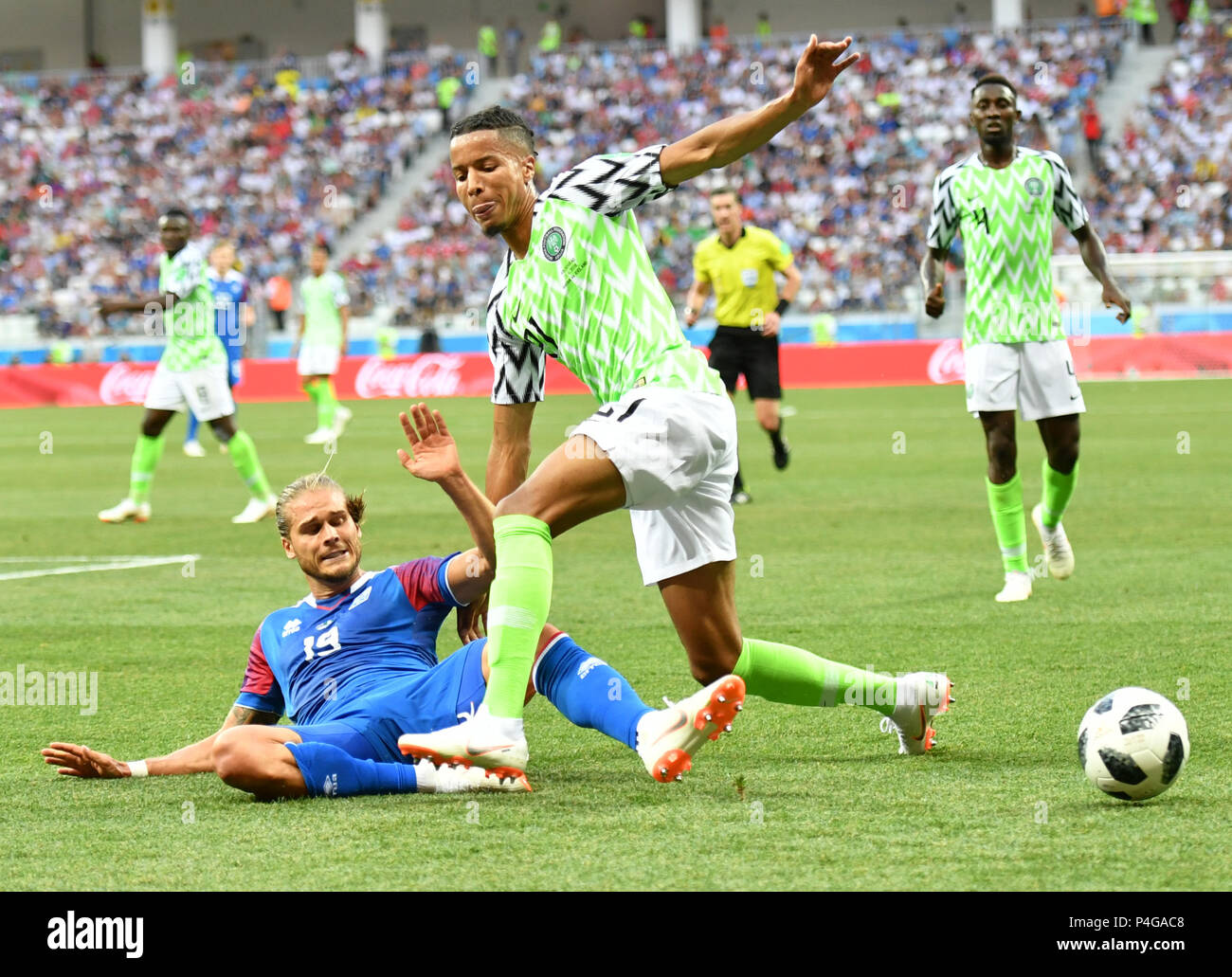 Volgograd, Russia. 22nd June, 2018. Tyronne Ebuehi (R front) of Nigeria vies with Rurik Gislason (L front) of Iceland during the 2018 FIFA World Cup Group D match between Nigeria and Iceland in Volgograd, Russia, June 22, 2018. Nigeria won 2-0. Credit: Lui Siu Wai/Xinhua/Alamy Live News Stock Photo