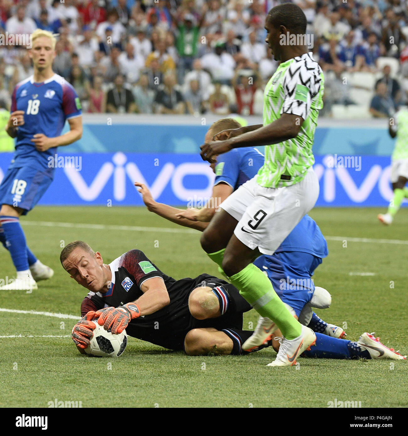 Volgograd, Russia. 22nd June, 2018. Iceland's goalkeeper Hannes Halldorsson (L bottom) defends during the 2018 FIFA World Cup Group D match between Nigeria and Iceland in Volgograd, Russia, June 22, 2018. Nigeria won 2-0. Credit: Lui Siu Wai/Xinhua/Alamy Live News Stock Photo