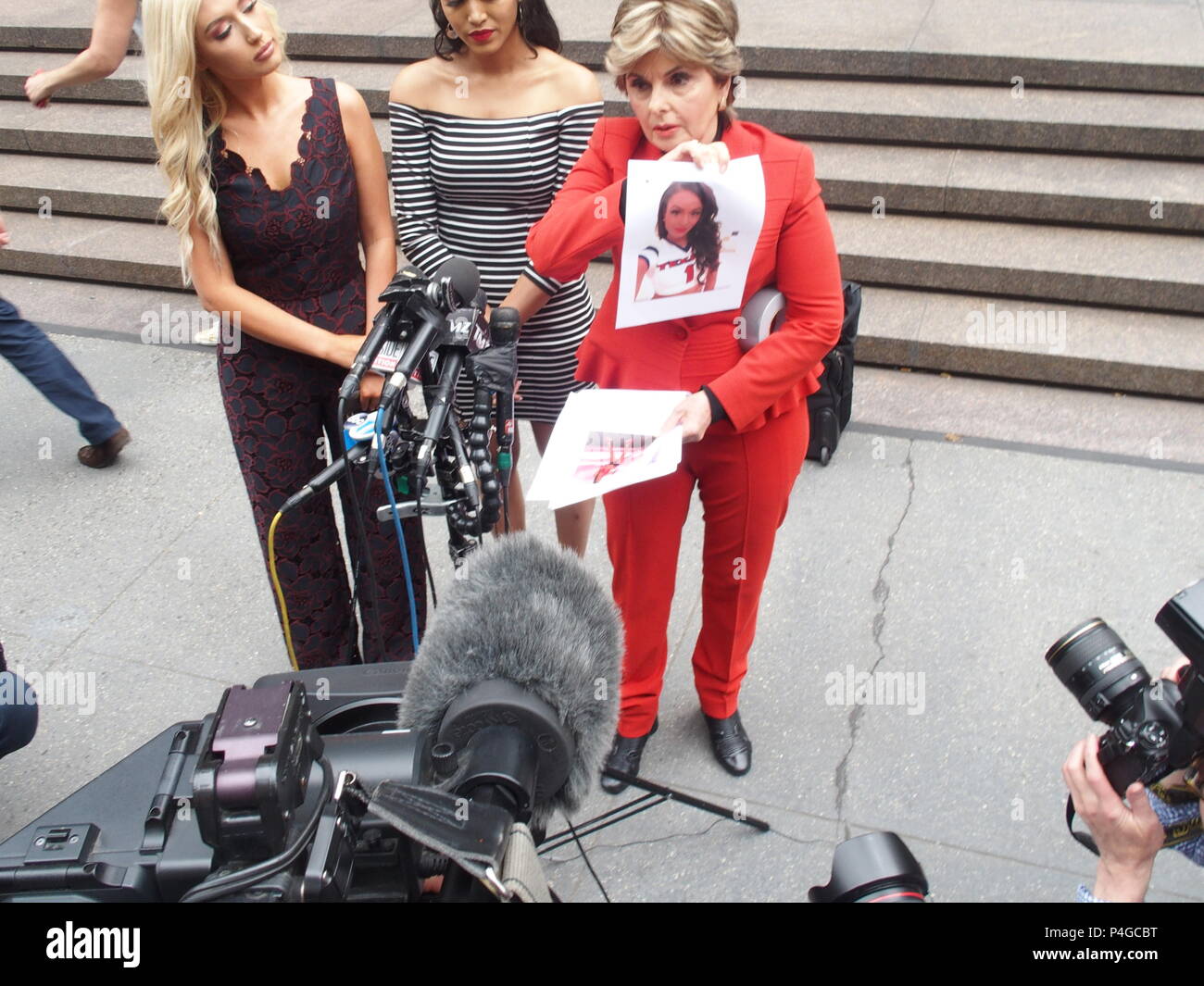 New York, New York, USA. 22nd June, 2018. Former Houston Texans Cheerleader Angelina Rosa sues the National Football League(NFL). Lawyer Gloria Allred holds a press conference in front of NFL Headquarters in New York City.Gloria Allred (right), Angelina Rosa (middle) Hannah Turnbow .(left) Credit: Bruce Cotler/Globe Photos/ZUMA Wire/Alamy Live News Stock Photo