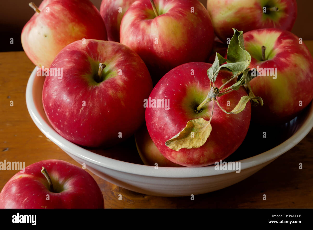 Ripe red honey crisp apples. Stock Photo