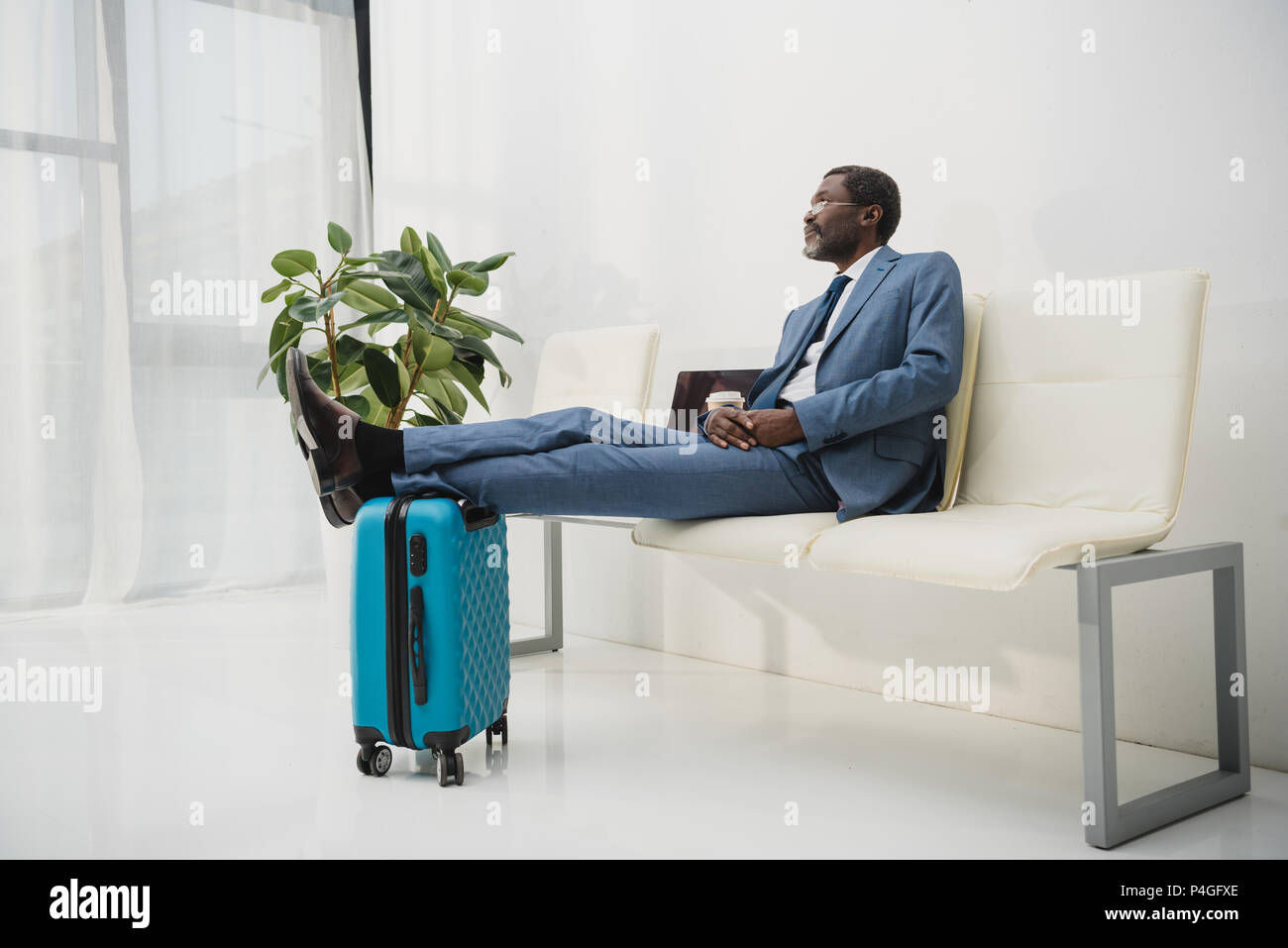 Business man african suit airport hi-res stock photography and images ...