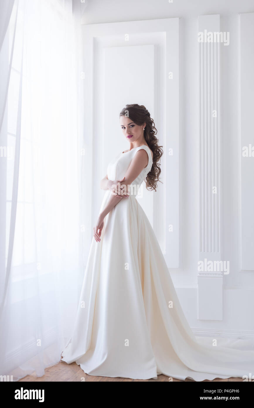 attractive brunette bride in wedding dress Stock Photo Alamy