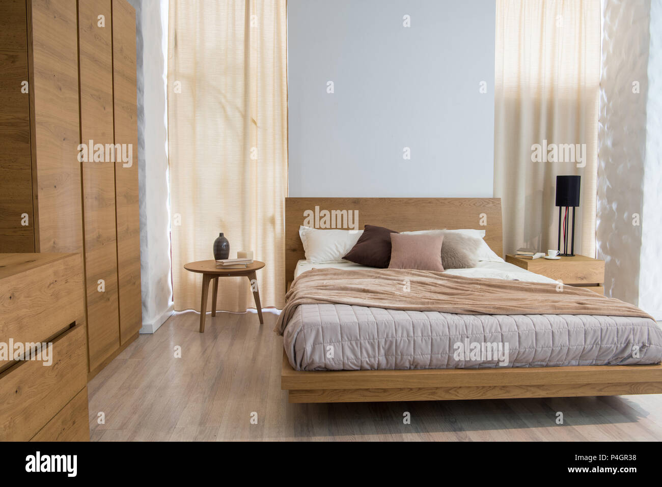 Interior of cozy bedroom with closet and bed in modern design Stock ...