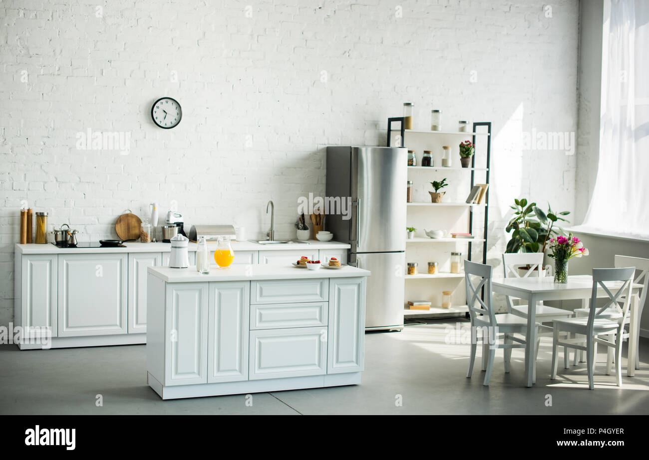 interior of modern light kitchen with furniture Stock Photo - Alamy