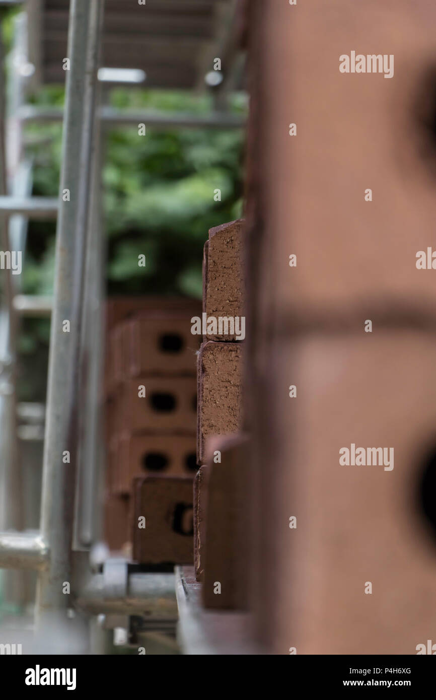 Stacks of brisks around the construction site Stock Photo