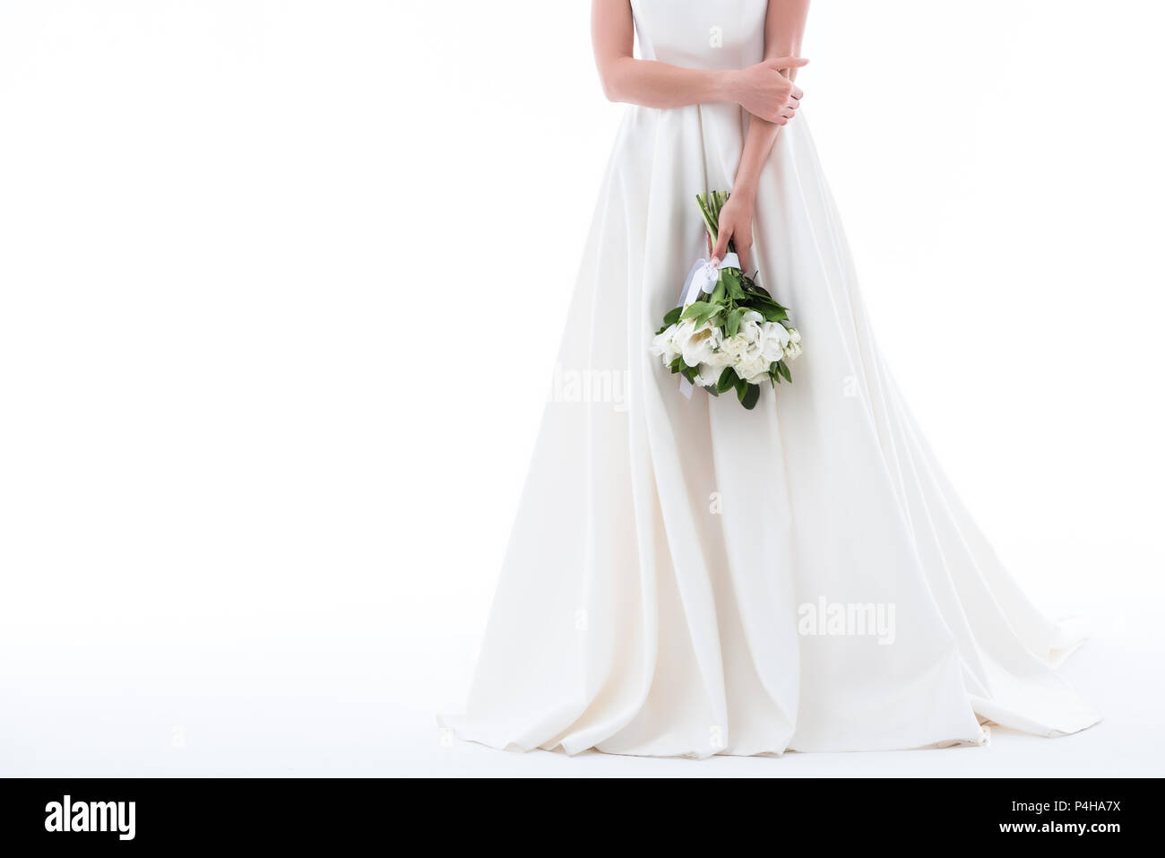 cropped view of elegant girl in wedding dress with bouquet, isolated on ...