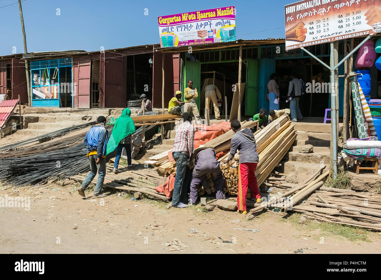 Addis Ababa, Ethiopia, January 30, 2014, Men building materials outside