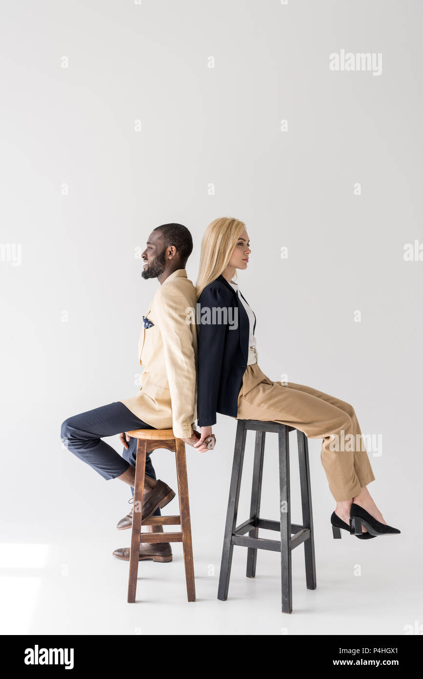 People Sitting On Stools Stock Photos & People Sitting On Stools Stock Images Alamy