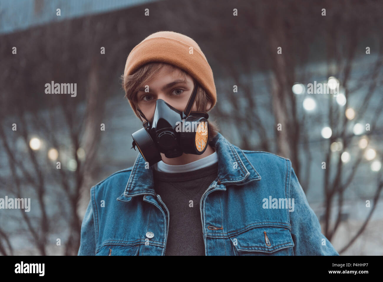 Young man spray painting hi-res stock photography and images - Alamy