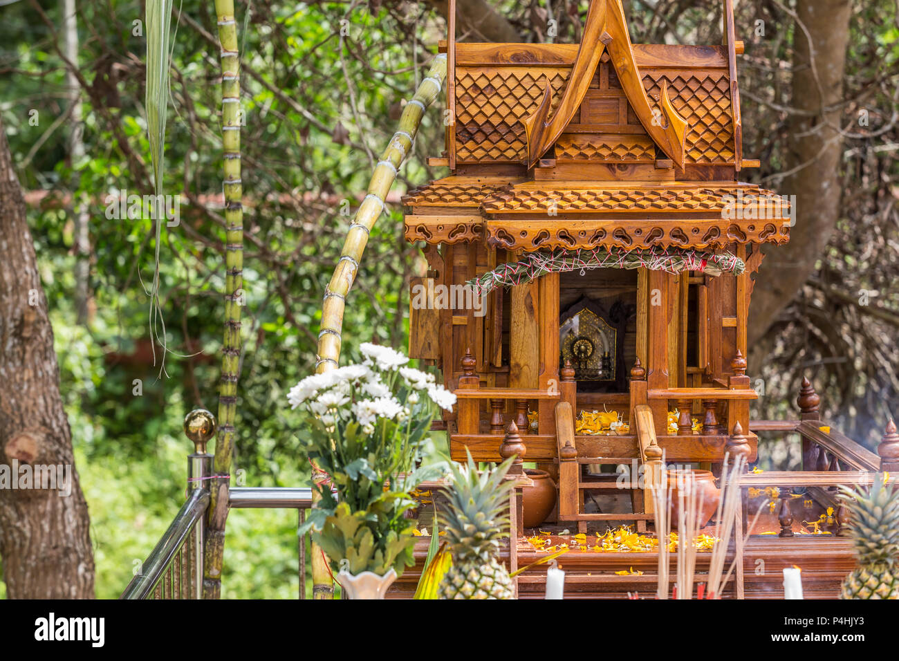 Beautiful Thai style spirit house or house of the guardian spirit is