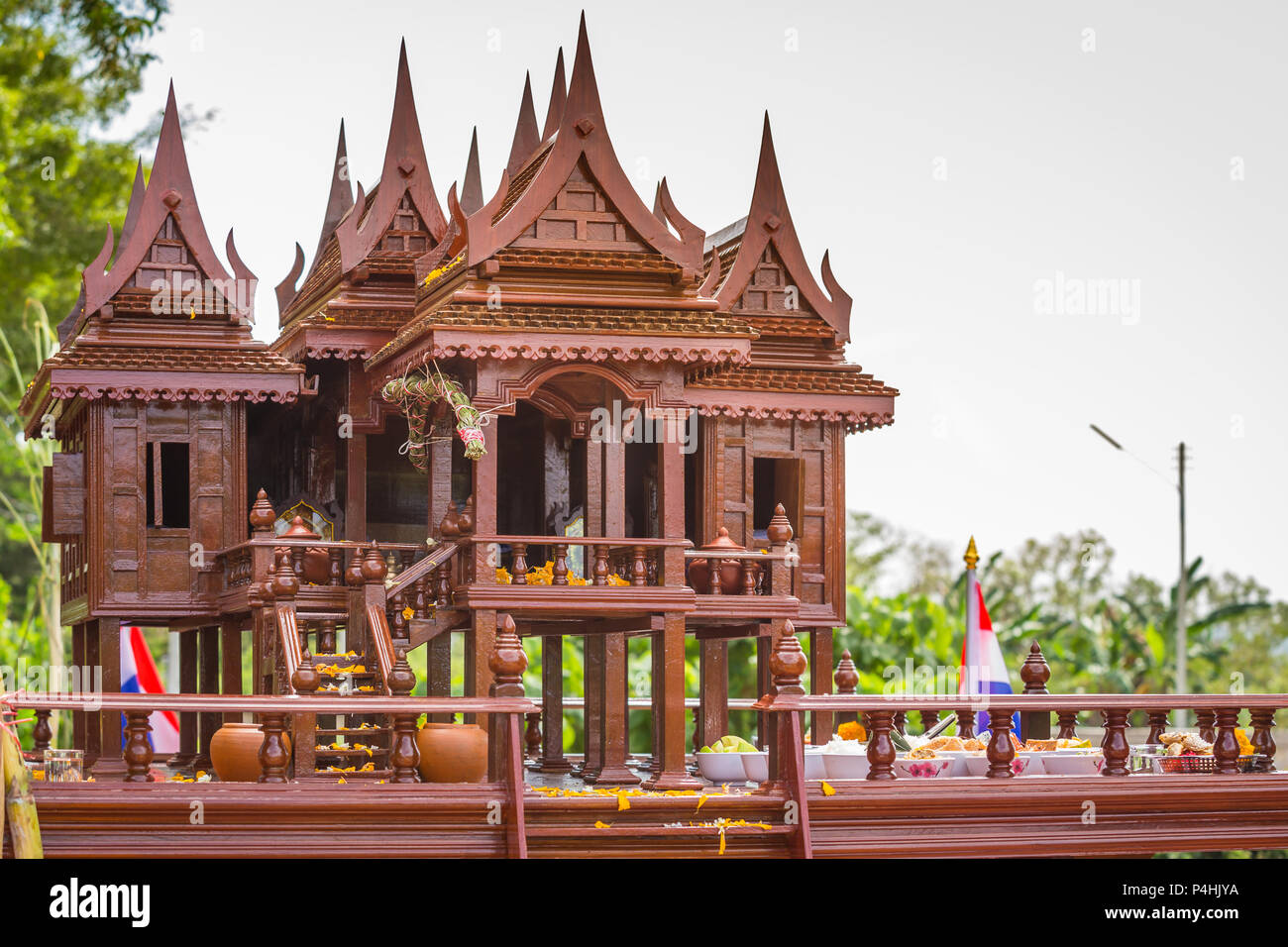 Beautiful Thai style spirit house or house of the guardian spirit is