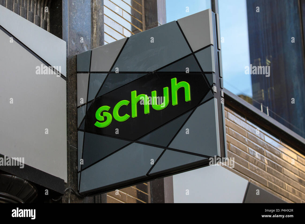 LONDON, UK - FEBRUARY 16TH 2018: A sign above the shop entrance to Schuh, located on Oxford Street in London, UK, on 16th February 2018.  Schuh is a f Stock Photo