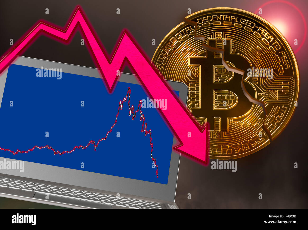Bitcoin coin cracked in market crash with laptop graph Stock Photo