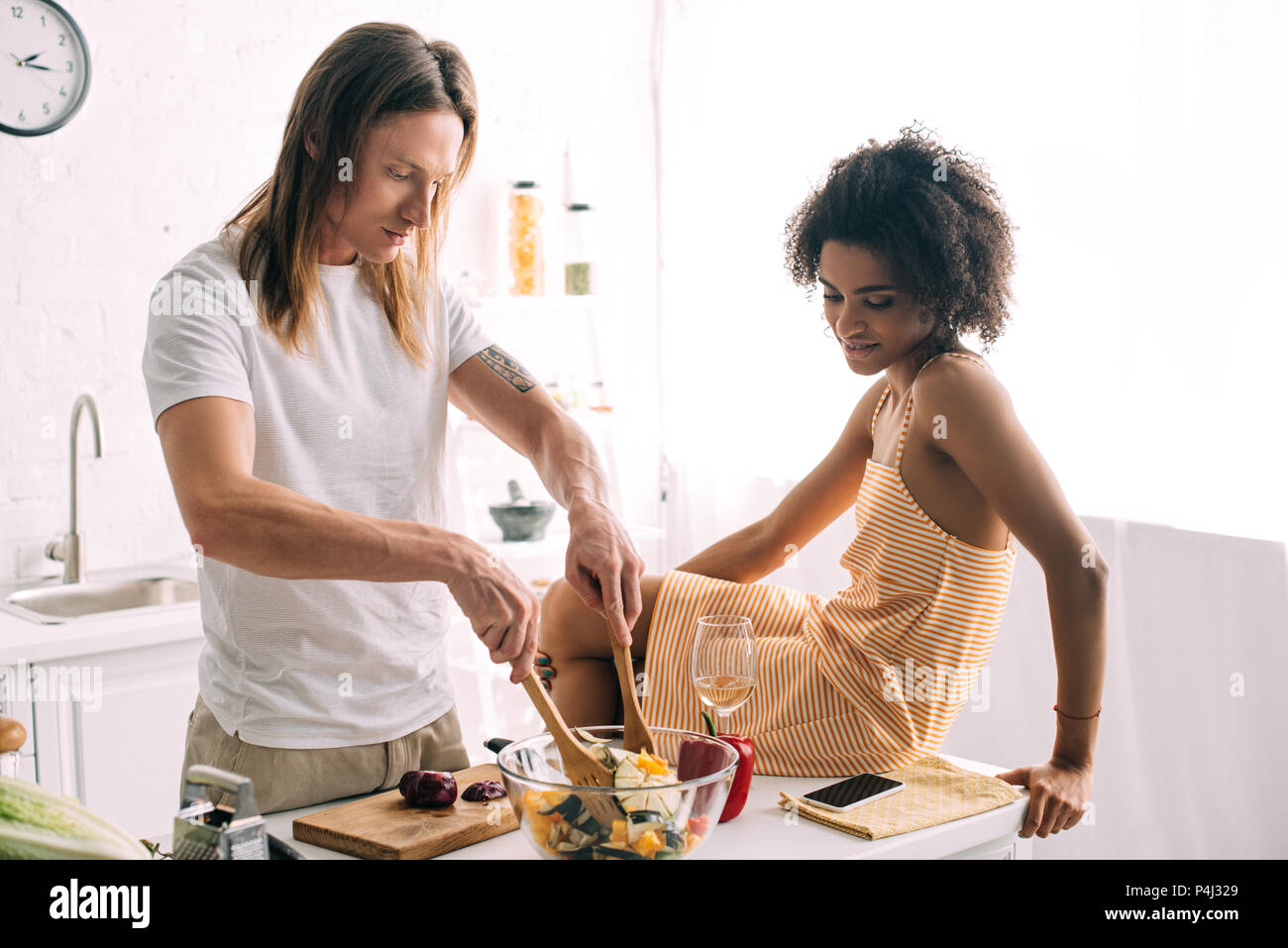 Готовка на кухне. Мужчина на кухне сготовит. Мужчина ест суп. Повар готовит еду. While he is cooking he.