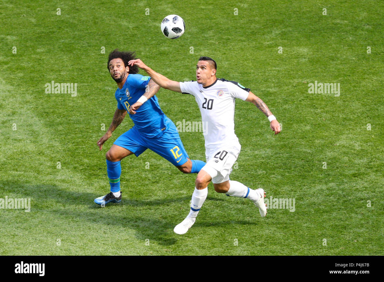 Brazil's Marcelo (left) and Costa Rica's David Guzman battle for the ball during the FIFA World Cup Group E match at Saint Petersburg Stadium, Russia. Stock Photo