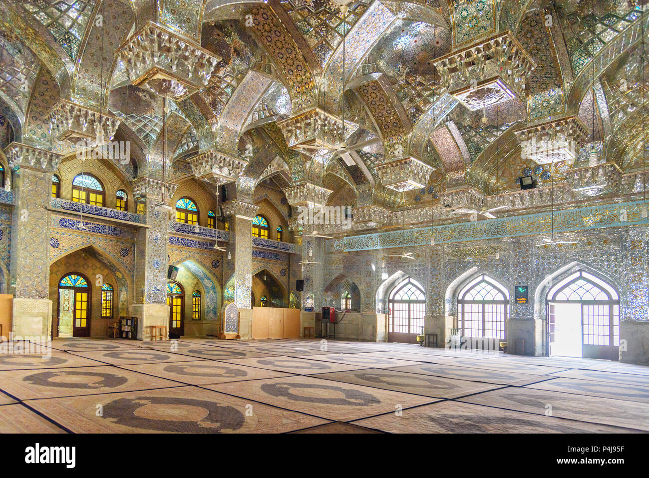 Shiraz, Iran - March 25, 2018: Interior of mirrored mausoleum of Sayyed Alaeddin Hossein Stock Photo