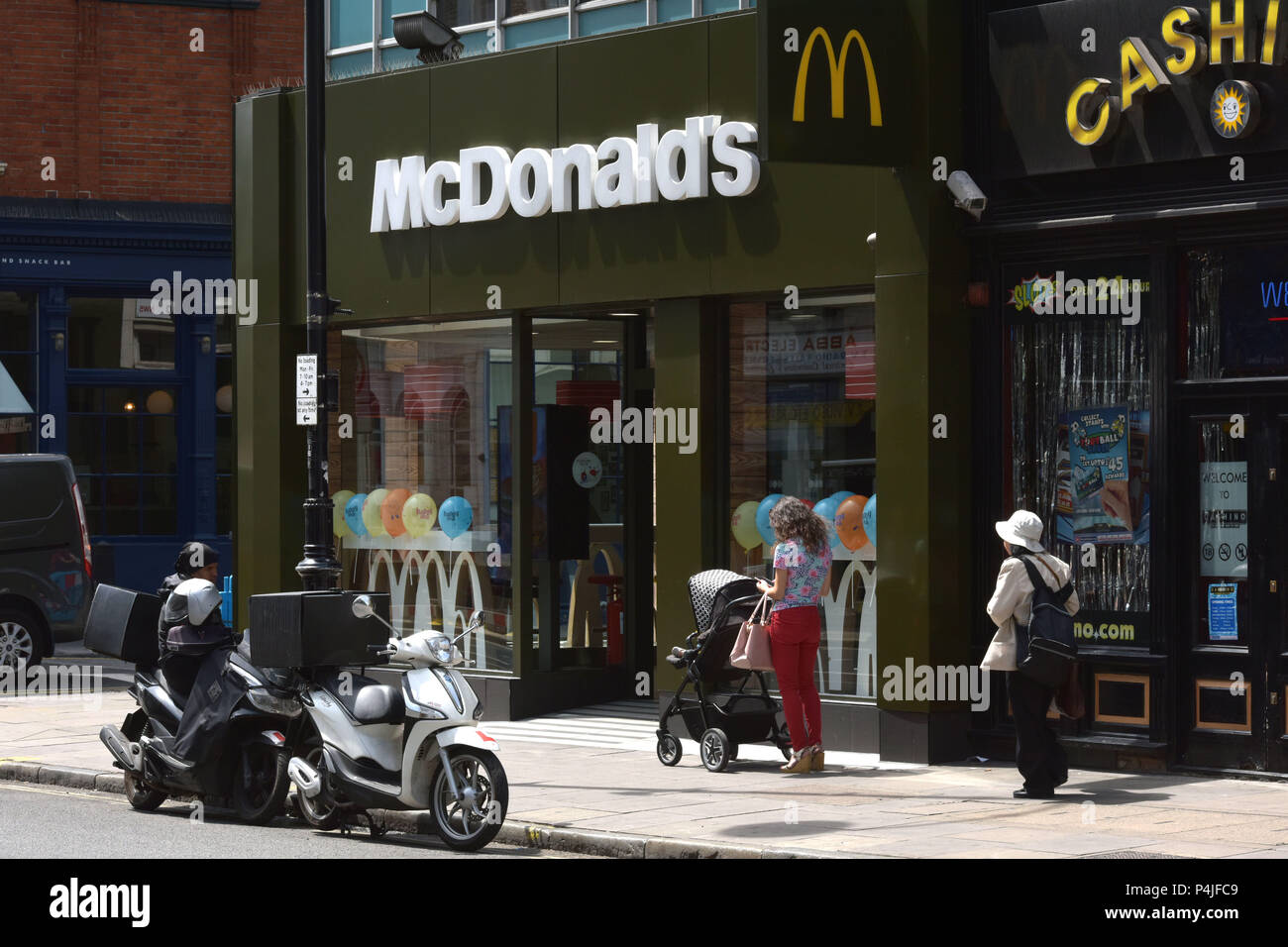 An outlet of fast food american hamburger franchise McDonalds in Kentish Town, North London. Stock Photo