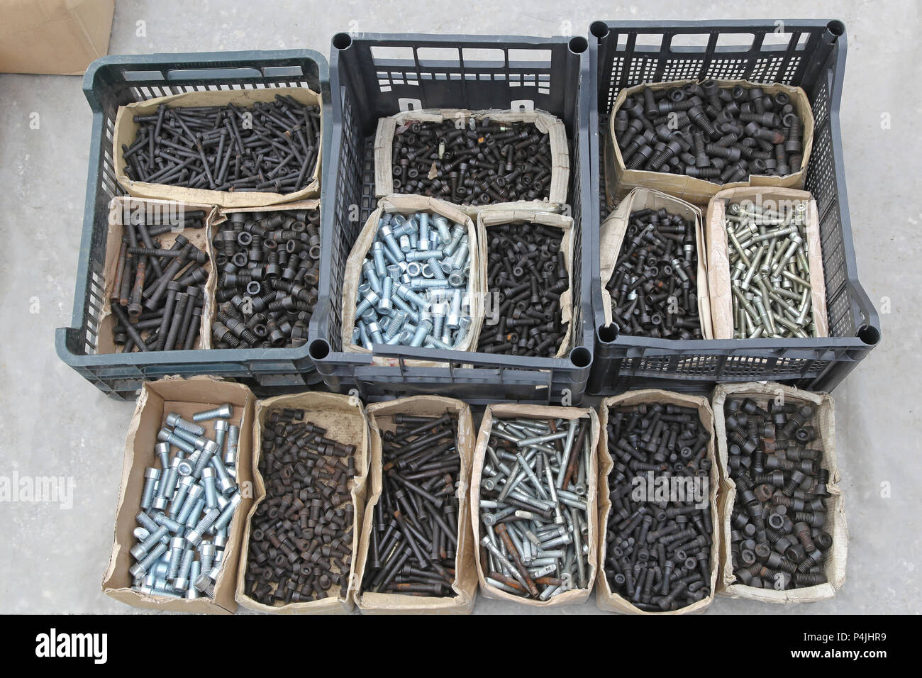 Hex Bolts Nuts in Boxes and Crates Stock Photo Alamy